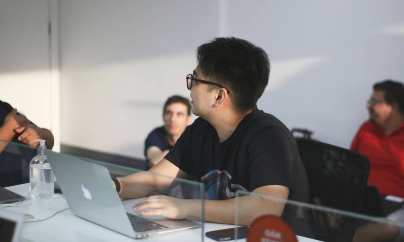 Financial analysis team reviewing comprehensive market data and stability metrics