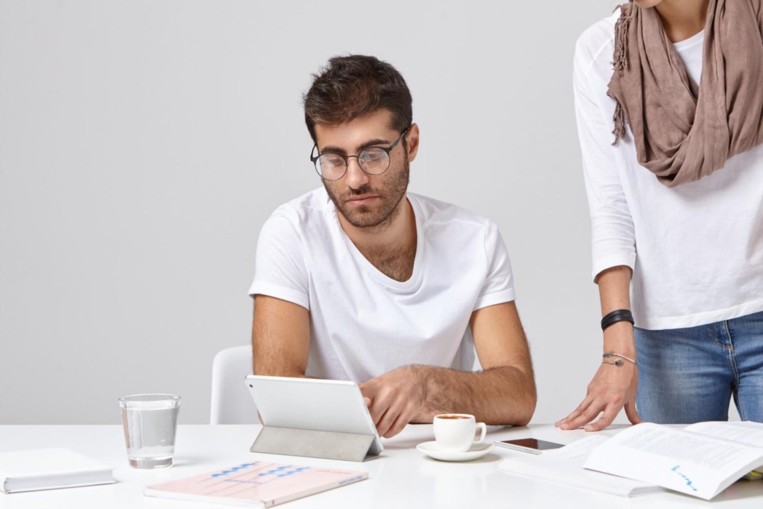 Professional financial consultant reviewing business documents